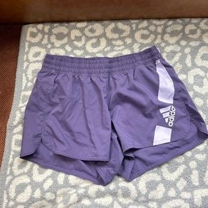 Purple Adidas running shorts